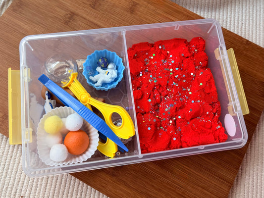 Space themed sensory bin for kids. Kinetic sand sensory bin for kids 