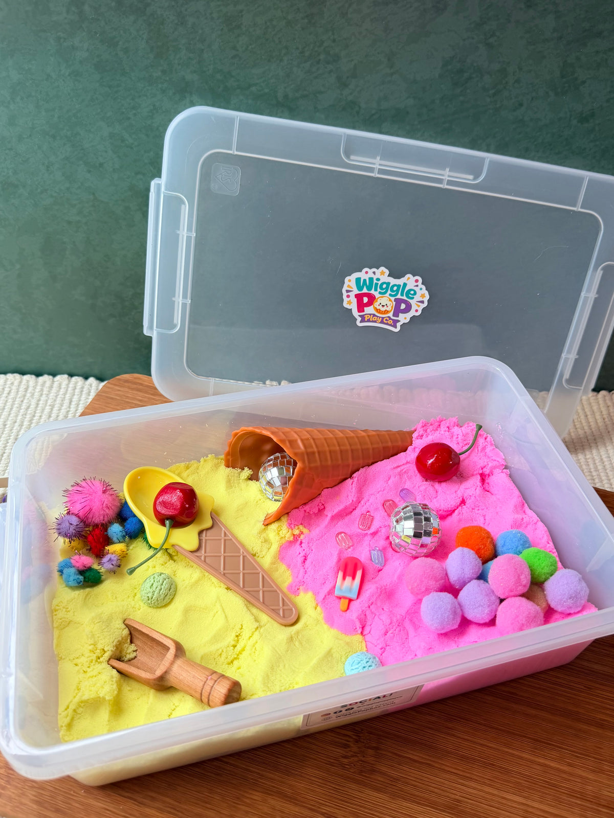 Kinetic sand sensory bin with lid. Ice cream themed kinetic sand sensory bin. 
