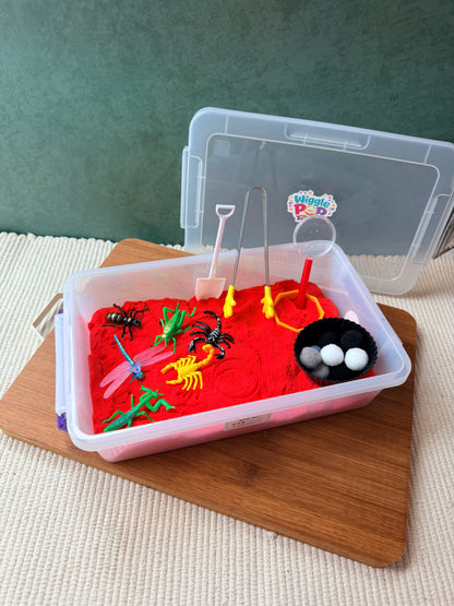 Large kinetic sand sensory bin for kids. Nature themed sensory bin for children.