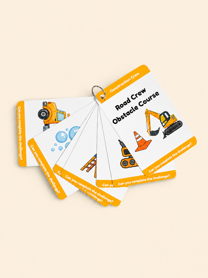 A set of construction-themed obstacle course cards fanned out on a light beige background. The cards are white with bright orange borders and feature illustrations of construction vehicles and equipment, with the top card reading 'Road Crew Obstacle Course'.