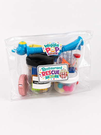 A toy restaurant rescue kit in a clear zippered bag, featuring a blue telescopic toy, a tape measure, a small challenge cube, and containers with colorful magnetic pieces. The front has a 'Wiggle Pop' logo and a 'Restaurant Rescue' sticker.