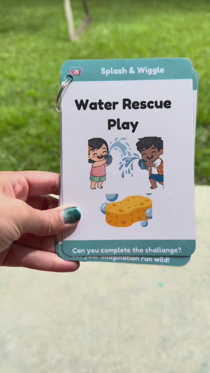Video of the items inside the splash and wiggle play box including activity card play prompt packet, 6 sponge balls, 2 bowls, a bubble wand, a feed the shark page, 6 toss bean bags, a growing ocean creature, a pair of mini tongs